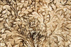 Het de gipspleisterwerk van de muurkunst van bloemenontwerpen op buitenkanten van 200 éénjarigentempel stock afbeelding Het de gipspleisterwerk van de muurkunst van bloemenontwerpen op buitenkanten van 200 éénjarigentempel stock afbeelding