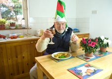 Het dineren alleen bij Kerstmis. royalty-vrije stock afbeeldingen Het dineren alleen bij Kerstmis. royalty-vrije stock afbeeldingen