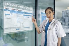 Het elektronische medisch dossiersysteem toont op transparante vertoning Royalty-vrije Stock Afbeeldingen Het elektronische medisch dossiersysteem toont op transparante vertoning Royalty-vrije Stock Afbeeldingen