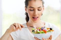 Het eten van gezond voedsel stock afbeeldingen Het eten van gezond voedsel stock afbeeldingen