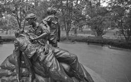 Het Gedenkteken van de Vrouwen van Vietnam--Beeldhouwwerk van Offer en de Dienst stock foto's Het Gedenkteken van de Vrouwen van Vietnam--Beeldhouwwerk van Offer en de Dienst stock foto's
