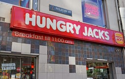 Het hongerige Jack ` s snel voedselrestaurant buiten van de opslag bepaalde de plaats van Oxford St & CNR-Pelikaanstraat royalty-vrije stock fotografie Het hongerige Jack ` s snel voedselrestaurant buiten van de opslag bepaalde de plaats van Oxford St & CNR-Pelikaanstraat royalty-vrije stock fotografie