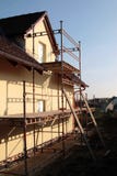 Het huisbouw van de familie stock afbeeldingen Het huisbouw van de familie stock afbeeldingen