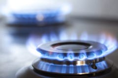 Het kooktoestel van het keukengas met het branden van het gas van het brandpropaan royalty-vrije stock foto's Het kooktoestel van het keukengas met het branden van het gas van het brandpropaan royalty-vrije stock foto's