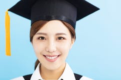 Het meisjesgezicht van de close-up mooi gediplomeerd student royalty-vrije stock afbeelding Het meisjesgezicht van de close-up mooi gediplomeerd student royalty-vrije stock afbeelding