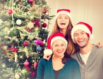 Het Portret van de Kerstmisfamilie stock foto Het Portret van de Kerstmisfamilie stock foto