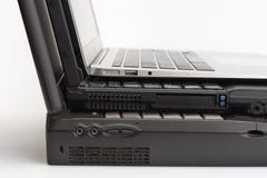 Het vergelijken van laptops, nieuwe moderne en twee oude laptops royalty-vrije stock afbeeldingen Het vergelijken van laptops, nieuwe moderne en twee oude laptops royalty-vrije stock afbeeldingen