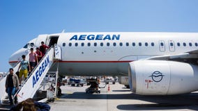Het Vliegtuig van de Aeganlucht stock afbeelding Het Vliegtuig van de Aeganlucht stock afbeelding