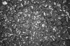 Het zwart-witte asfalt is macro stock afbeeldingen Het zwart-witte asfalt is macro stock afbeeldingen