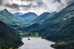 Large cruise ship anchoring in fjord of Norwegian coast royalty free stock image Large cruise ship anchoring in fjord of Norwegian coast royalty free stock image