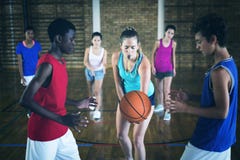 High school kids about to start playing basketball stock photo High school kids about to start playing basketball stock photo