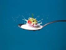 High-speed photo of strawberries falling into milk royalty free stock images High-speed photo of strawberries falling into milk royalty free stock images