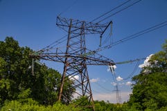 High-voltage power line against the blue sky with clouds royalty free stock image High-voltage power line against the blue sky with clouds royalty free stock image