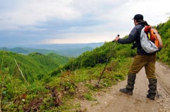 Hiker On A Mounatin Trek Royalty Free Stock Image
