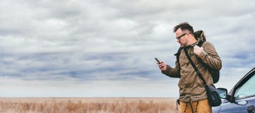 Hiker Using Smart Phone Outdoor Stock Images Hiker Using Smart Phone Outdoor Stock Images