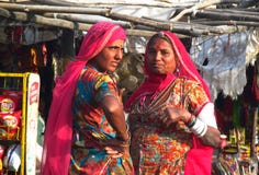Hindu women dressed in colorful sari