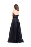 Hintere Ansicht der jungen Schönheit im schwarzen Abendkleid stockfoto Hintere Ansicht der jungen Schönheit im schwarzen Abendkleid stockfoto