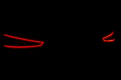 Hintere Autolichter Auf Einem Schwarzen Hintergrund Autos Beleuchten Spuren Nachtstadtstrasse Mit Verkehrsscheinwerfer Leuchten Si Stockfoto Bild Von Schwarzen Autos