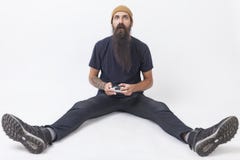 Hipster With A Game Controller On The Floor Royalty Free Stock Images Hipster With A Game Controller On The Floor Royalty Free Stock Images