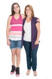 Hispanic teenage girl hugging her mother isolated on white Stock Photos Hispanic teenage girl hugging her mother isolated on white Stock Photos