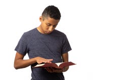 Hispanic Teenager Boy Searching The Pages Of History Book Royalty Free Stock Photos