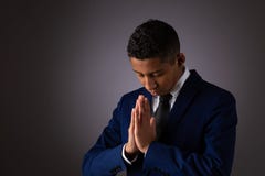 Hispanic Teenager Boy Seeking To Commune With God Via Prayer. Talking With God And Opening His Heart Stock Photo Hispanic Teenager Boy Seeking To Commune With God Via Prayer. Talking With God And Opening His Heart Stock Photo