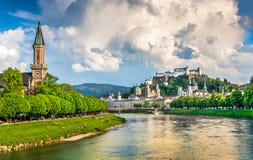 Historic city of Salzburg with dramatic clouds in summer, Austria