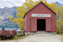 Historic Red Railway Shed At Glenorchy With Mountain And Golden Fall Colors Foliage Background Royalty Free Stock Photos