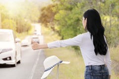 Hitchhiking Tourism Concept. Traveling Alone, When There Is A Problem, Need Help Royalty Free Stock Photo
