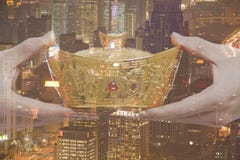 Holding Chinese New Year Gold Ingot, Night City View Holding Chinese New Year Gold Ingot, Night City View