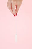 Holding clean tampon. royalty free stock photo Holding clean tampon. royalty free stock photo