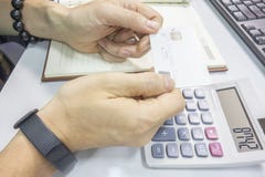 Holding a white credit card in his hand stock photography Holding a white credit card in his hand stock photography