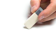 Holdingradiergummi der Männer Handauf lokalisiertem backgroung, Abschluss oben lizenzfreie stockbilder Holdingradiergummi der Männer Handauf lokalisiertem backgroung, Abschluss oben lizenzfreie stockbilder