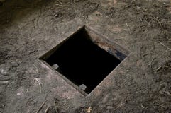 Hole in floor of old house leading to cellar stock image Hole in floor of old house leading to cellar stock image