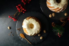 Holiday Bundt Cake With Creamy Vanilla Frosting - With Holiday Decorations Royalty Free Stock Photos Holiday Bundt Cake With Creamy Vanilla Frosting - With Holiday Decorations Royalty Free Stock Photos