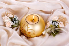 Holiday Candle And Flowers Against Royalty Free Stock Images