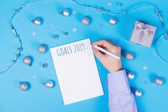 Holiday decoration and notebook on blue background royalty free stock image Holiday decoration and notebook on blue background royalty free stock image