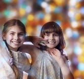 Holiday portrait of happy children against bright background stock photos Holiday portrait of happy children against bright background stock photos