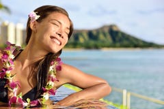 Holiday woman relaxing enjoying sun at pool resort Stock Image Holiday woman relaxing enjoying sun at pool resort Stock Image