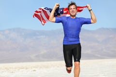 Hombre con la bandera americana - los E.E.U.U. del atleta del corredor foto de archivo libre de regalías Hombre con la bandera americana - los E.E.U.U. del atleta del corredor foto de archivo libre de regalías