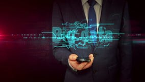 Hombre de negocios con concepto del holograma del smartphone y de la muestra de IOT Hombre de negocios con concepto del holograma del smartphone y de la muestra de IOT