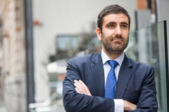 Hombre de negocios confidente imagen de archivo Hombre de negocios confidente imagen de archivo