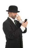 Hombre de negocios que mira su smartphone. fotografía de archivo Hombre de negocios que mira su smartphone. fotografía de archivo