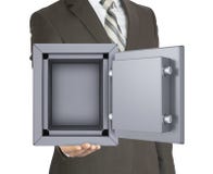 Hombre en una caja fuerte abierta de la tenencia del traje imagen de archivo Hombre en una caja fuerte abierta de la tenencia del traje imagen de archivo