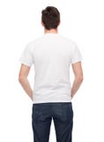 Hombre joven en camiseta blanca en blanco de la parte posterior Foto de archivo libre de regalías Hombre joven en camiseta blanca en blanco de la parte posterior Foto de archivo libre de regalías