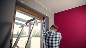 Man Applying Painter S Tape Stock Footage Video Of