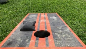 Home made dusty corn hole lawn game