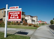 Home For Sale Signs & One Sold royalty free stock image Home For Sale Signs & One Sold royalty free stock image