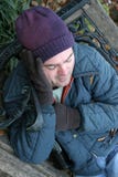 Homeless Man Keeps Warm