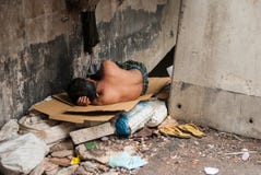 Homeless man sleeps on the street , Bangkok thailand. royalty free stock photography Homeless man sleeps on the street , Bangkok thailand. royalty free stock photography